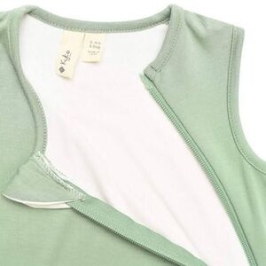 Set of 2 Kyte Baby footed sleep sacks in Matcha and Pine (discontinued colors)